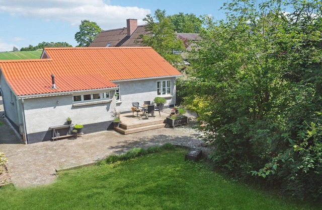 Surrounded by green meadows and fields, this inviting vacation home in Westseeland welcomes you.