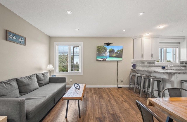 Sylvan Lake Carriage House ~ Sleeps 4 adults and 2 children ~ Private Patio