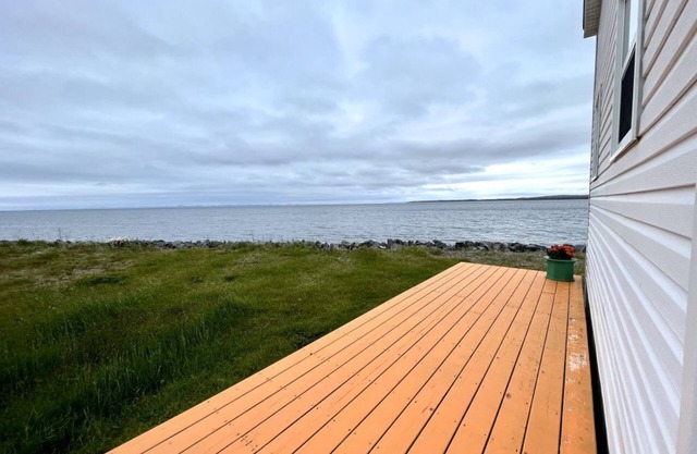 Take it easy at this tranquil getaway, only steps from the beach!