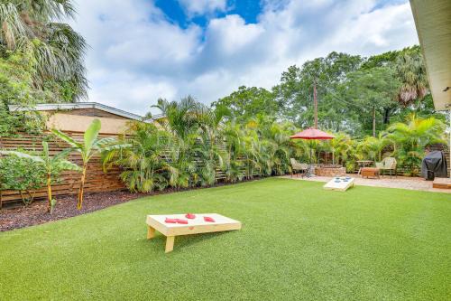 Tampa Home with Fire Pit, Yard, Cornhole and More!