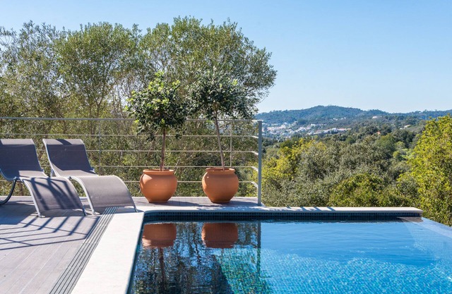 Tasteful class Villa with heated pool and beautiful view.