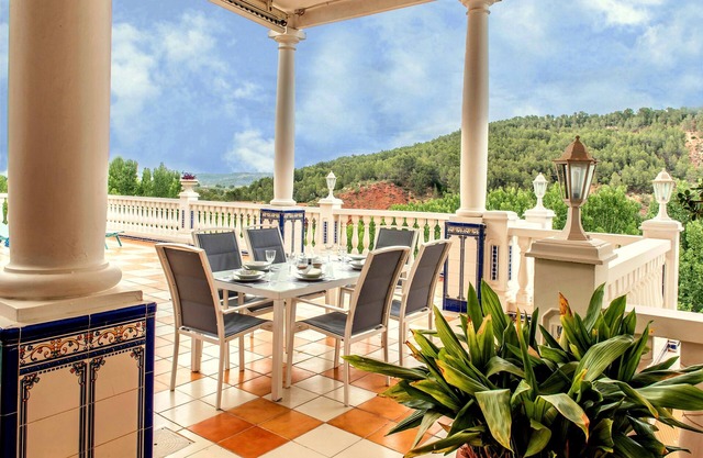 That impress patio overlooking mountains and the sound of water in the fountain