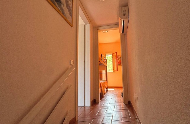 The apartment is developed on two levels within a tourist village