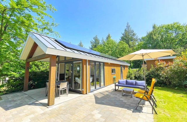 The beautiful Eco Cottage has a unique decor, covered porch and a large garden.