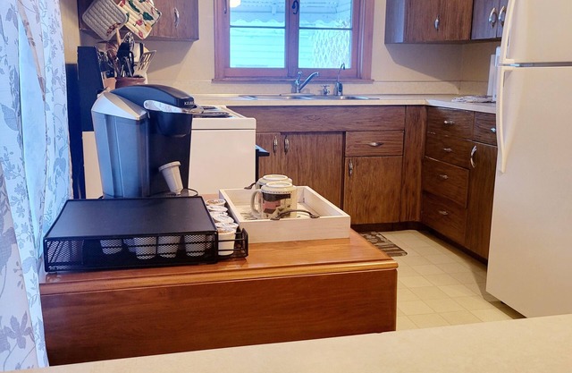 The Cozy Cottage is nestled in a charming neighborhood for the perfect get-away.