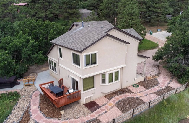 The Glen House, a lovely 4 bedroom home in Palmer Lake, with hot tub, and views!
