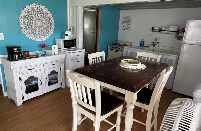 The Hummingbird rustic lakefront cottage at The Pier at Canadohta Lake sleeps 7!