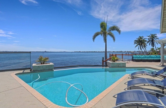 The River View 1008 - SE Cape Coral Riverfront Luxury Pool Home Pool Table and more