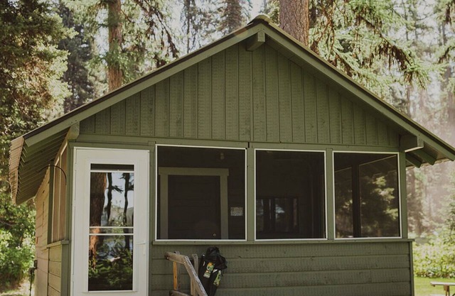 Thimbleberry is at Tamaracks Resort, with a screened-in porch facing the lake.