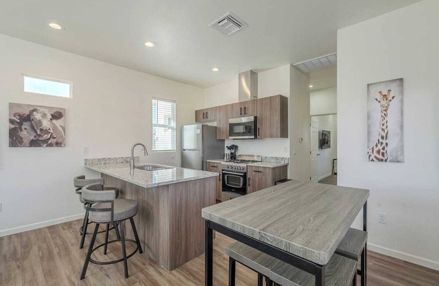 This centrally located 2 bedroom 2 bathroom is fully remodeled with electric vehicle charging on site