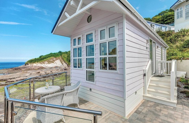 This chic country style beach hut is ideal for a romantic escape by the sea.