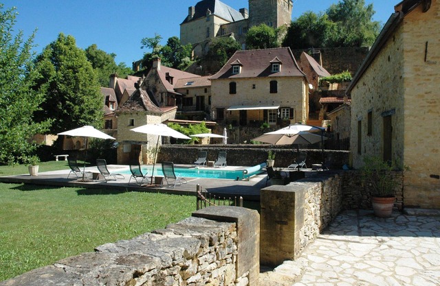 time for a break-The little house in the center of the village with a view of the castle