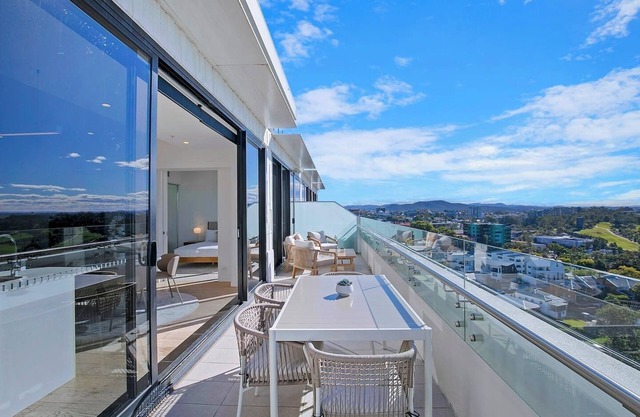 Top of Spring Hill Balcony Bliss and Poolside Escape
