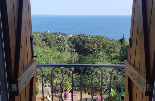 Top of villa, terraces, swimming pool at Mont St Clair, pétanque court with sea view