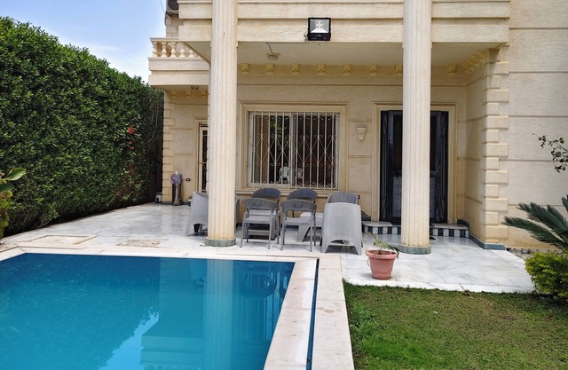 Tranquil 4-bedroom villa with WiFi and AC in Iking Maryut