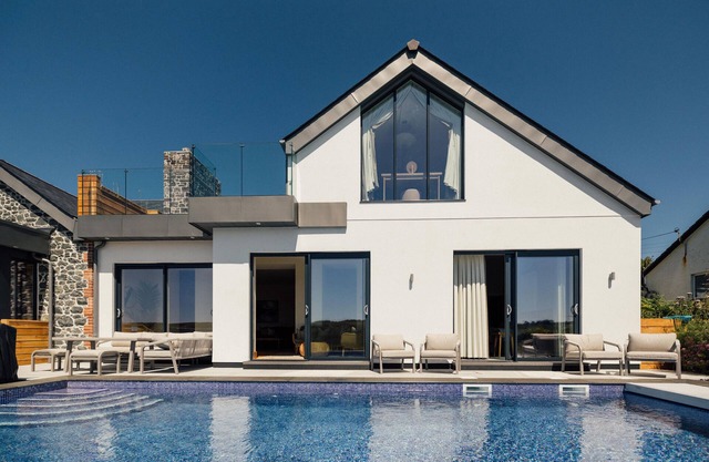 TREVEAN, pet friendly, luxury holiday cottage, with pool in Mullion