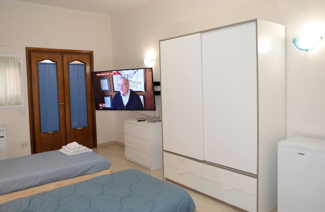 TRIPLE ROOM WITH BALCONY AND SAMSUNG TV LATEST GENERATION