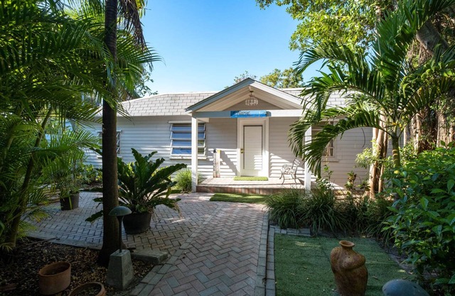 Tropical bayfront villa with sandy beach