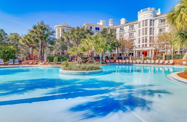 Tropical condo at The Village of Baytown Wharf with AC, pool, hot tub, & gym