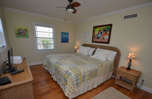 **TROUT ** Close beach access. lovely two bedroom w/ screened porch and pool