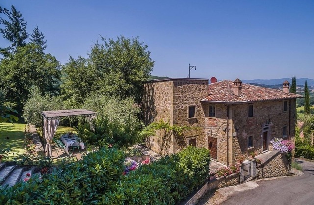 Tuscan villa rental with private pool, jacuzzi, walk to town and views