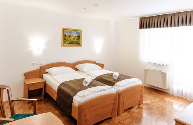Twin Room with Balcony 1