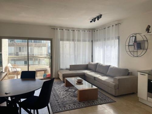 Two Bedroom Apt l Terrace & Private Parking l On The Beach l by Bookiz