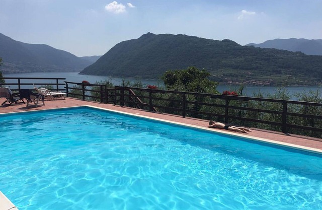 Two-room apartment in Residence with swimming pool and panoramic lake view in Sale Marasino