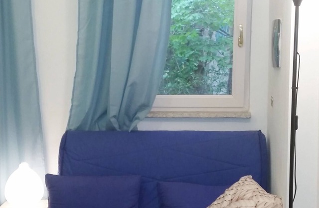 Two-room apartment 300 meters from the sea in a villa with garden (IUN FO 665)