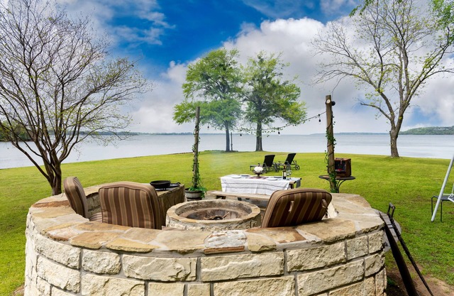 Two Waterfront cottages for the price of one! Porch living area off main house !