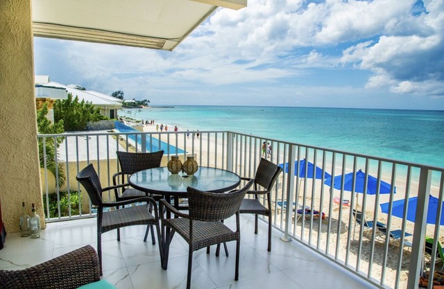 Unique Oceanfront Condo on 7-Mile-Beach. Private Balcony. Cayman Reef Resort #30
