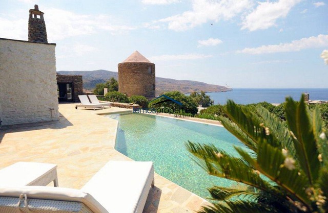 Unique stone villa with a swimming pool and sea view in Koundouros