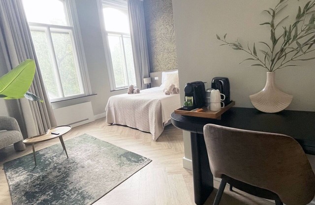 Unwind in this refined suite, blending modern comfort with historic charm.