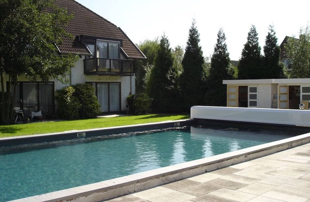 Unwind with Terrace Dining, Seasonal Pool & Free Parking in Lekkerkerk