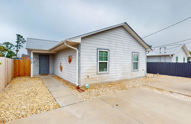 Updated duplex with private yard, patio, updated interior, & great location