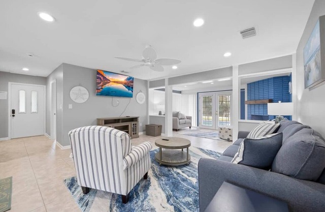 Updated Waterfront Pool Home with Putting Green