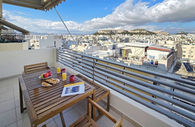 Urban Oasis with Acropolis Views by GHH
