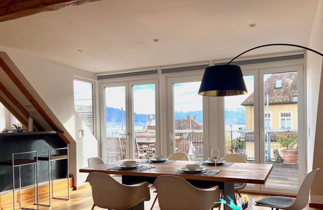 Vacation apartment with lake view - maisonette with roof terrace in the old town house on the island