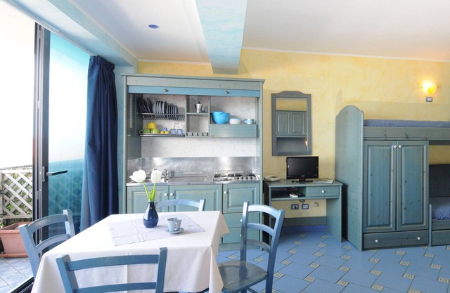 Vacation Home "Oasi Azzurra - Monolocale Standard 1" with Shared Pool & Shared Terraces