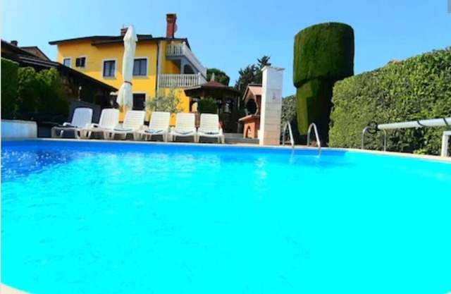 Vacation home * with heated pool and beautiful views of the sea.