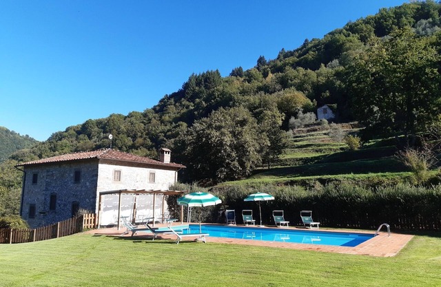 Very large house, surrounded by green, sunny, whit a private pool.