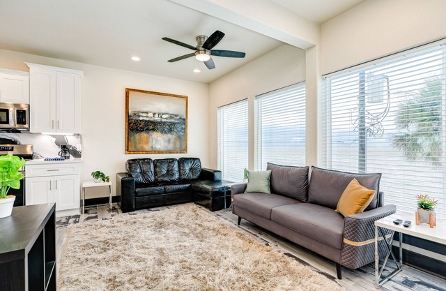 Vibrant orange retreat with an enclosed yard, grill, and ocean views - dogs ok