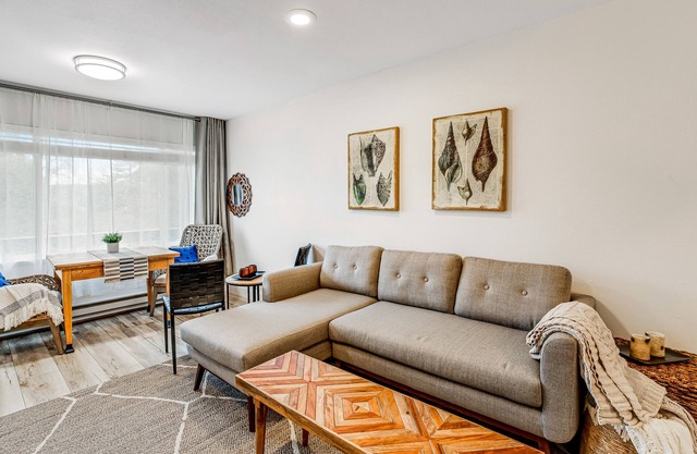 Vibrant, polished condo with oceanfront views, patio & W/D access