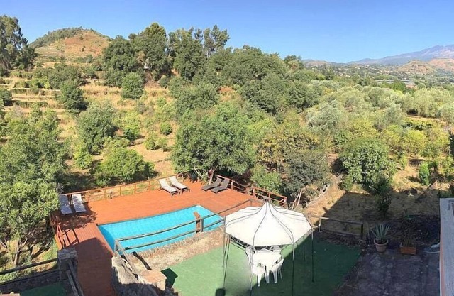 Villa Carlina B: A graceful apartment surrounded by the greenery.