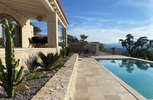 Villa Chalarosi, natural stone villa with panoramic views and heated pool