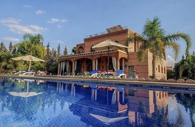 Villa Dar MOUDAR Marrakech large pool and garden with authentic architecture