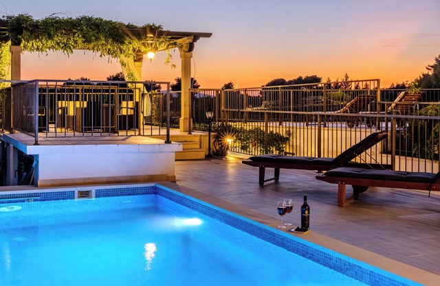 Villa Julia with a private heated pool and hot tub, ideal for large groups