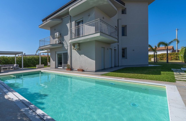 Villa 'Nigrò' with Sea View, Pool, Garden & Wi-Fi