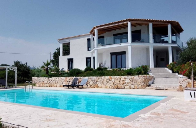 Villa VIO directly on the sea/beach with pool - miles of sandy beach