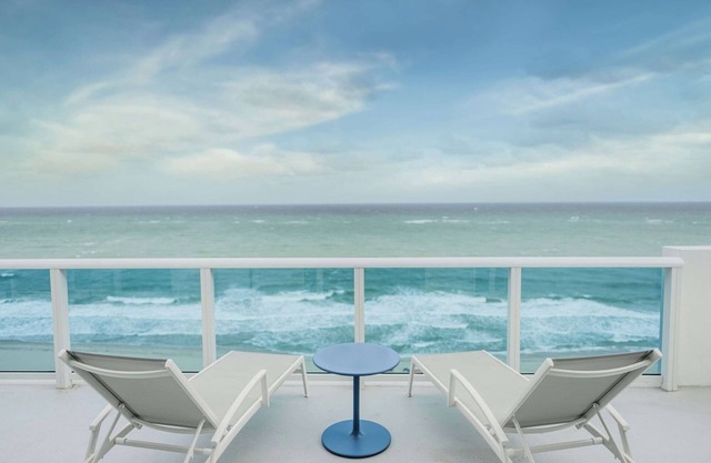 Warm and Inviting Beach Room with Private Balcony Overlooking the Marina